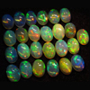 calebrated size 5x7 mm oval - Ethiopian Opal - really - tope grade high quality CABOCHON - oval shape - each pcs - have amazing - beautifull - flashy fire all around in the stone -25 pcs - approx -- STUNNING QUALITY - VERY VERY RARE